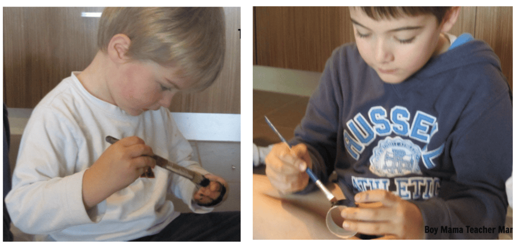 kids painting spiders