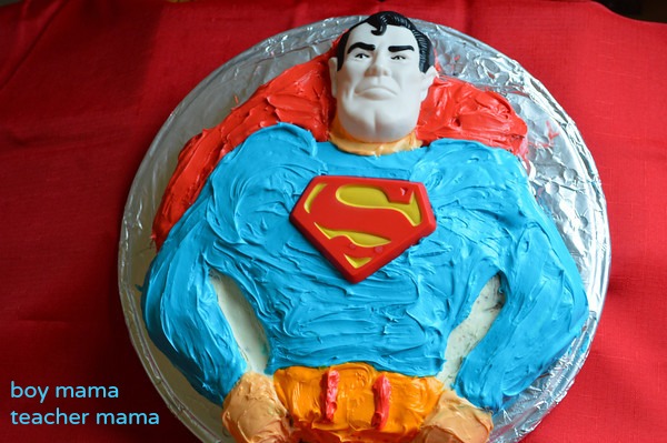 Round Yellow Blue Superman Theme Cake– Bloomsvilla